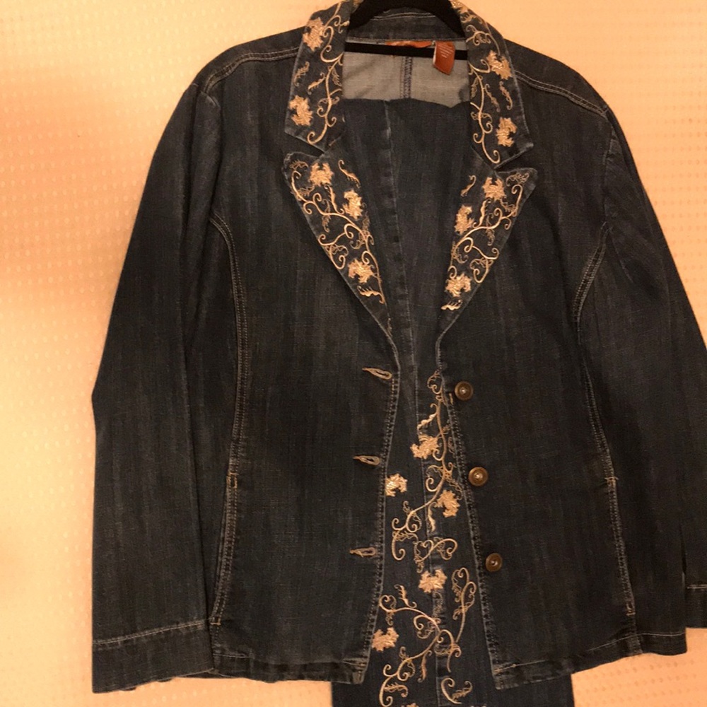Denim jacket and denim pants with gold embroidered on the pants and collar.